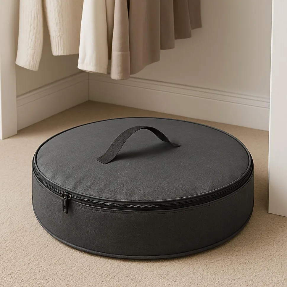 A fabric wreath storage bag with zipper, ready for the closet.