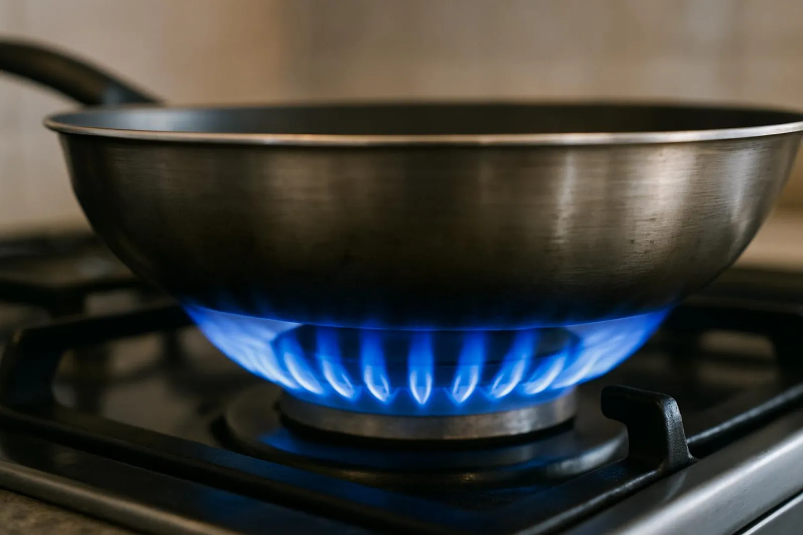 Blue gas flame under a pan