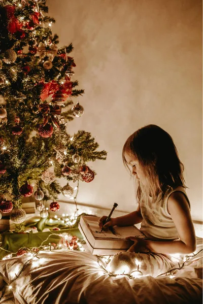 Kid decluterring with festive spirit