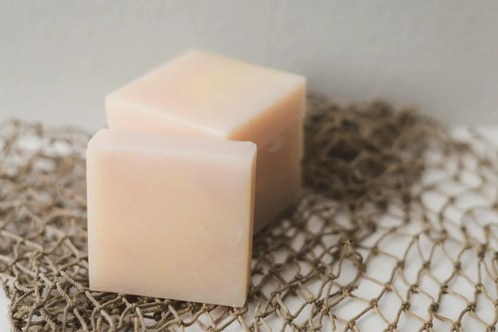 Handmade bar soap on a wooden tray