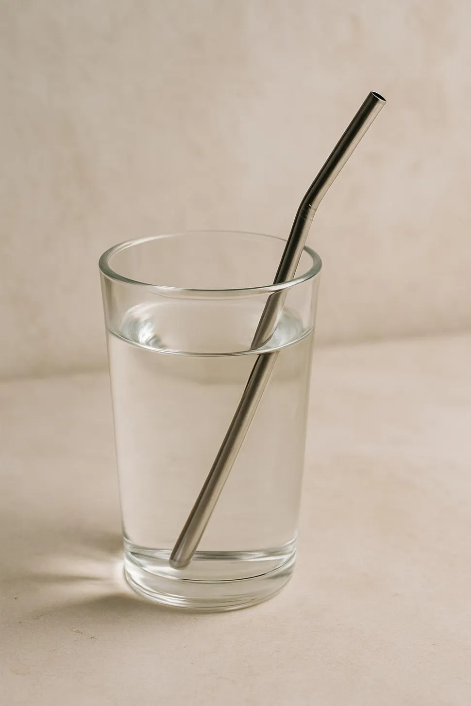Stainless steel straw in a glass